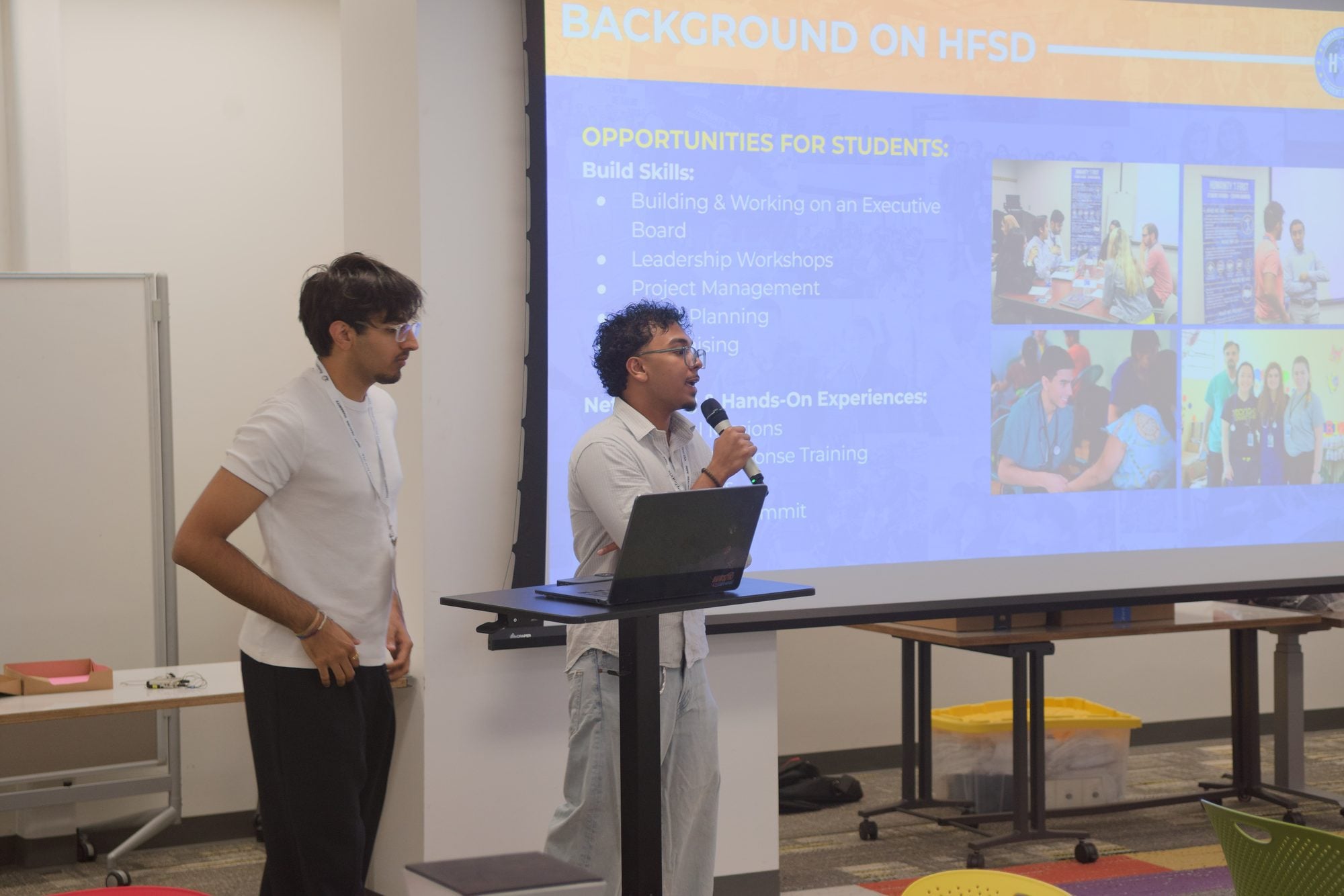 Two students present the opening Background on HFSD session at Summit 2026